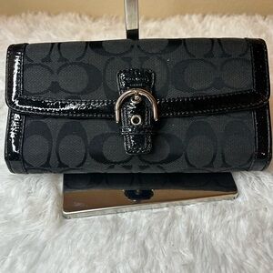 COACH Signature Long Wallet with Front Belt Design and Button Closure
